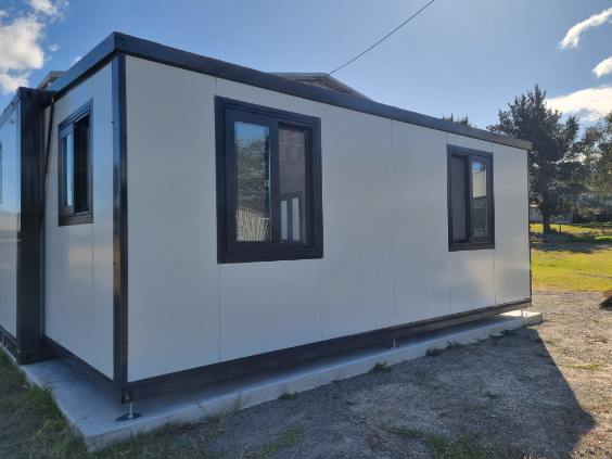 Expandable tiny home installation on site in Queensland