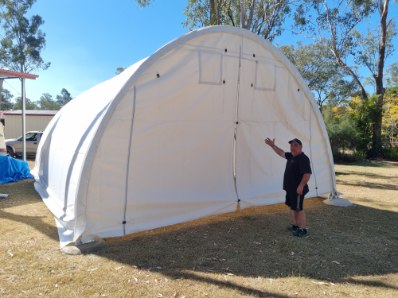 Outdoor carport dome installation with shade and storage space