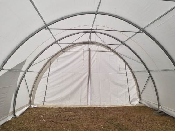 Licensed team assembling carport dome structure on site